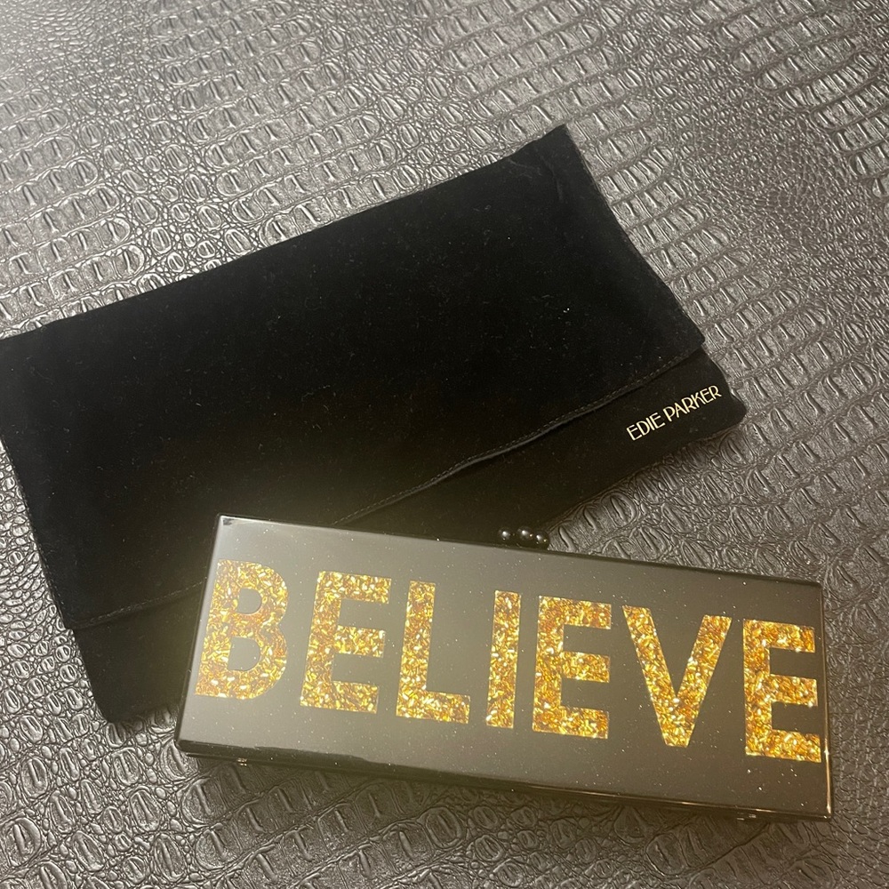 Edie Parker Dream & Believe Clutch Bag 
In Black with Gold & Silver Lettering